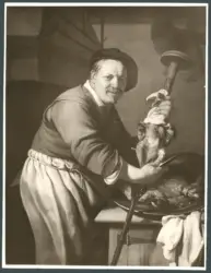 Uomo che prepara uno spiedo