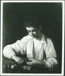 Ragazzo che sbuccia un frutto