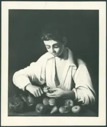 Ragazzo che sbuccia un frutto