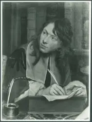 Giovane uomo che scrive