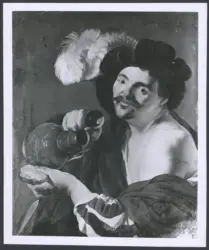Uomo con boccale e pane